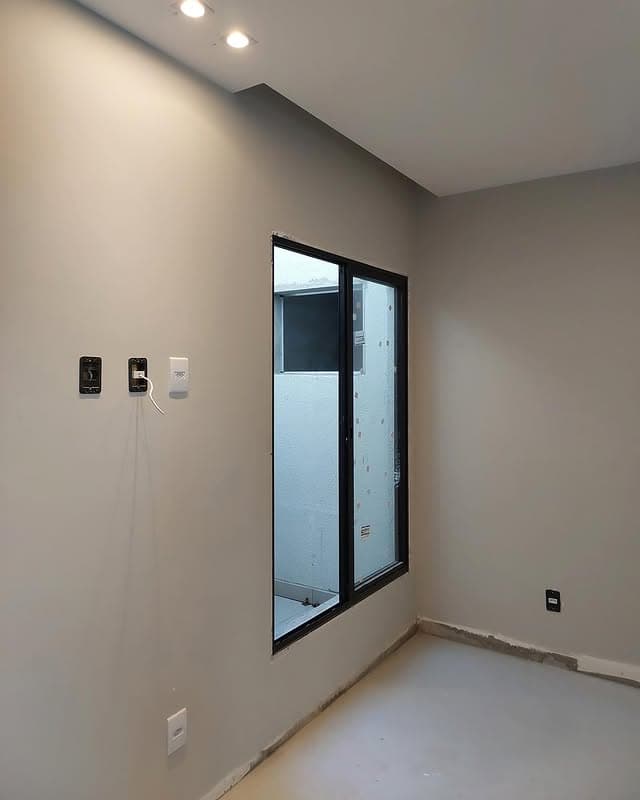 Habitación con paredes de bloque BLOCOBR pintadas y acabadas